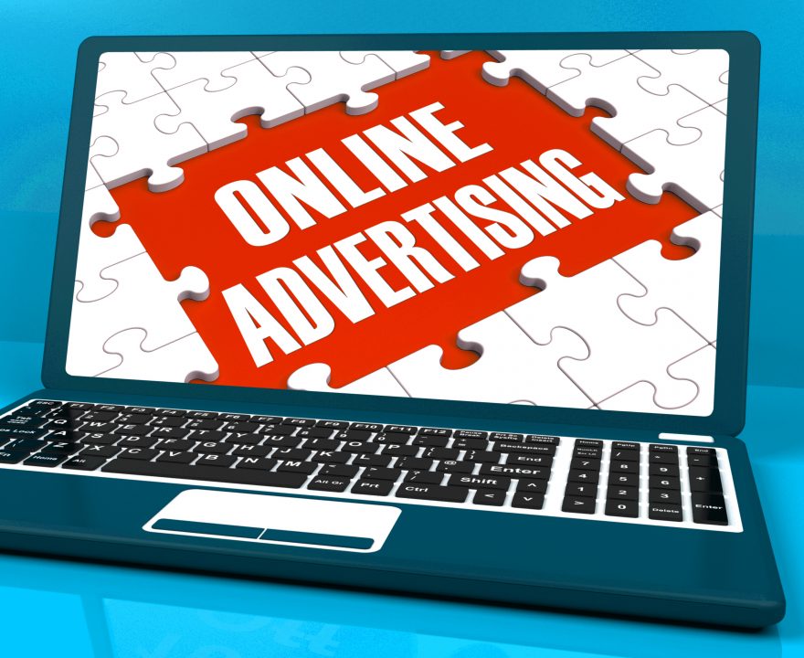 Online Advertising On Laptop Shows Websites Promotions And Ecommerce Strategies
